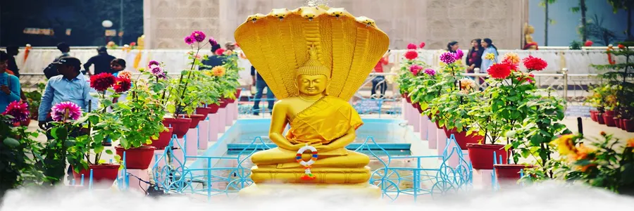 Buddhist pilgrims offering prayers at Kushinagara Mahaparinirvana site